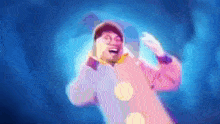 a blurry picture of a man in a clown outfit