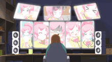 a girl is sitting in front of a computer monitor with a bunch of pink anime characters on it