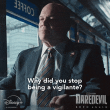 a man in a suit and tie is asking why did you stop being vigilante