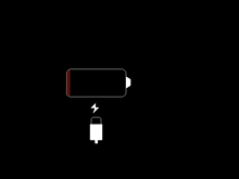 a black background with a battery and a lightning bolt on it .