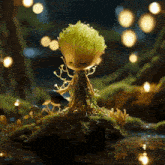 a doll with a green plant on its head sits on a rock