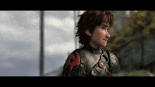 hiccup from how to train your dragon is wearing armor and looking at something