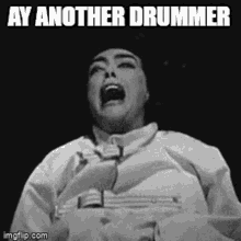 a black and white photo of a man screaming with the words ay another drummer below him