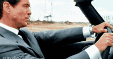 James Bond Driving Pierce Brosnan GIF - James Bond Driving Pierce Brosnan Pierce Brosnan Driving GIFs