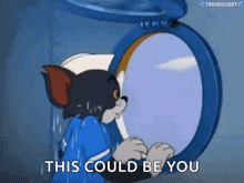 a cartoon of tom and jerry looking out of a window and saying `` this could be you '' .