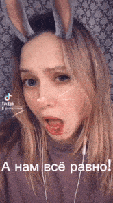 a girl wearing bunny ears and a tiktok sticker