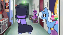 two ponies are standing in a hallway and one has a sign that says junior