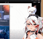 a video of a girl with a cat on her head is displayed on a screen