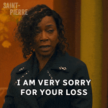 a woman in a black jacket says " i am very sorry for your loss "