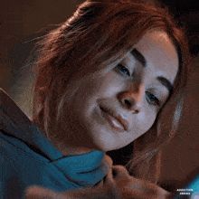 a close up of a woman 's face with the words addiction on the bottom right