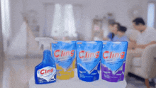 three bags of cling cleaner are on a table
