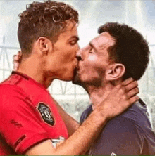 Messi Vs Ronaldo Messi Kiss GIF - Messi Vs Ronaldo Messi Kiss GIFs