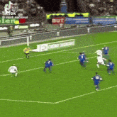 a soccer game is being played on a field with an ad for tiktok