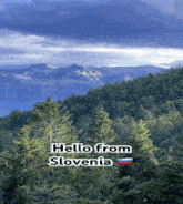 a picture of a mountain range with the words hello from slovenia on the bottom