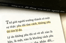 a book is open to a page with a yellow underlined phrase