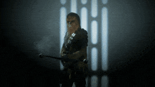 chewbacca from star wars is holding a sword in his hand