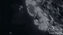 a gif from gifrun.com shows a jet flying through a cloudy sky