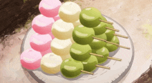 Kushi Dangos Places On Plate GIF