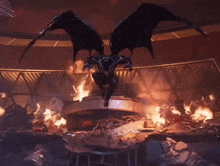 a demon is flying over a destroyed building with flames coming out of it