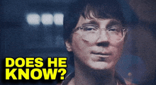 a close up of a man 's face with the words does he know below him