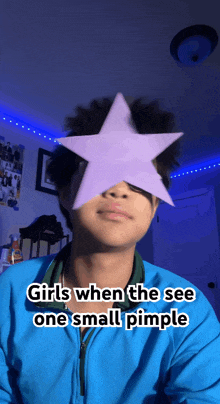 a boy with a purple star on his face and the words girls when the see one small pimple below him