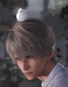 a person with a small white object on top of their head