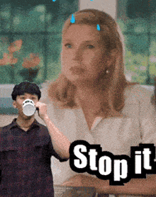 a man drinking from a cup next to a woman with the words stop it
