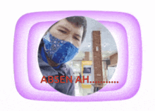 a picture of a man wearing a mask with the words absen ah written in red