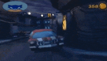 a video game scene with a cat and a car and the number 356 on the bottom