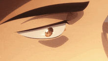 a close up of a person 's eye with a shadow on it