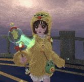 a girl wearing a yellow sweater and a duck hat is holding a frog bag