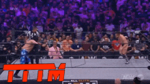 a wrestling match is being shown live on a tv channel