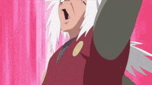 a man with white hair and a red shirt is standing in front of a pink wall .