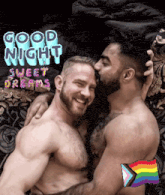 a couple of men hugging each other with the words good night sweet dreams behind them