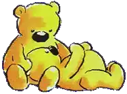 a yellow teddy bear is laying down with another bear