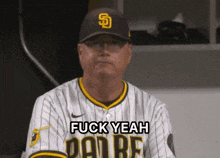 a padres baseball player says fuck yeah while wearing a hat