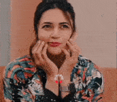 a woman wearing a watch with the word love on the band