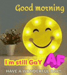 a picture of a smiley face that says good morning