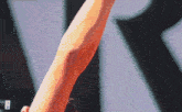 a close up of a person 's arm with the numbers 1 and 2 on it