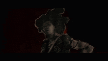 a black and white drawing of a woman with a huge afro and the words `` i was '' behind her .