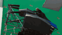 a green screen with the letters tab written in red