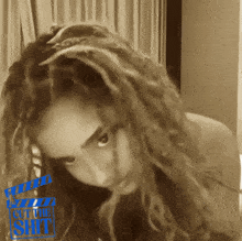 a picture of a woman with dreadlocks and a caption that says ' i 'm the shit ' on it
