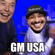a man wearing a hat that says multiverse is smiling and says gm usa