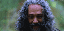 a man with long curly hair and a beard has the 20th century girl written on the bottom