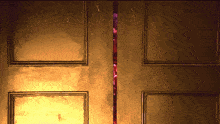 a door with a red light coming out of it is open