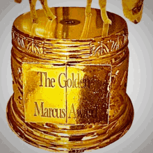 The Golden Marcus Award Trophy GIF - The Golden Marcus Award Gold Trophy GIFs