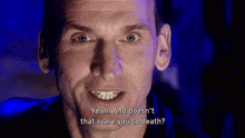a close up of a man 's face with the words yeah and does n't that scare you to death