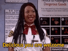 a woman in a uniform says delicious you are welcome