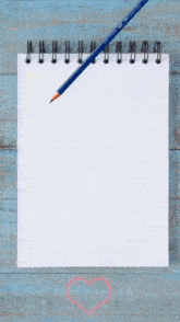 a drawing of a man and a woman on a notebook