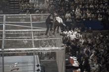 Undertaker Mankind GIF - Undertaker Mankind Hell In A Cell GIFs
